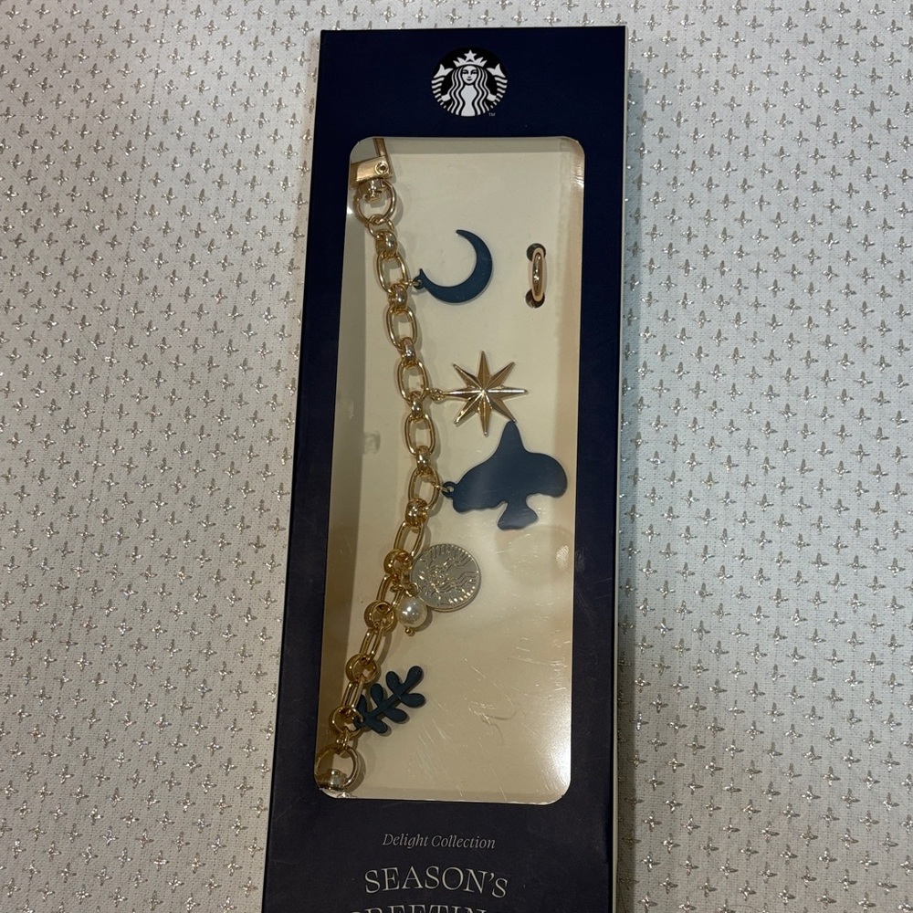 Starbucks Cream Bag Charm with Gold Chain and Blue Charms